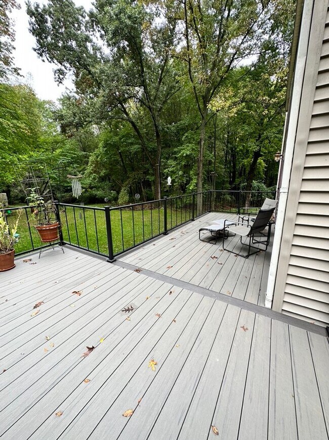 Building Photo - Dream Home in Highland, Michigan: Your Private Oasis on 5 Wooded Acres