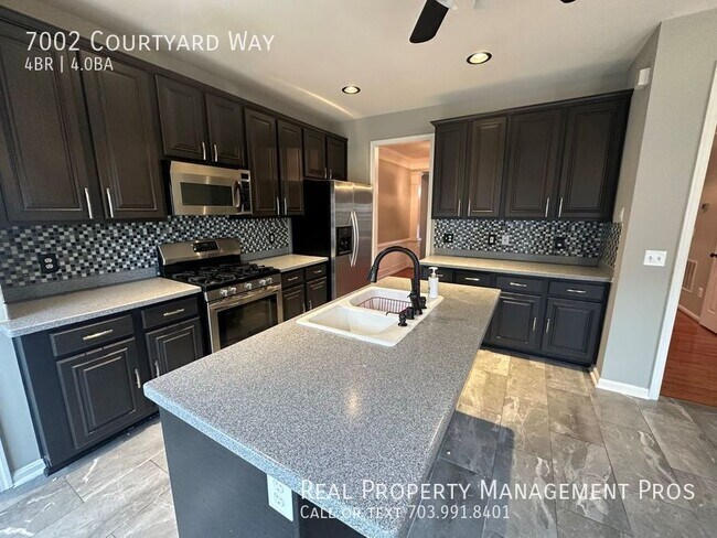 Building Photo - 7002 Courtyard Way