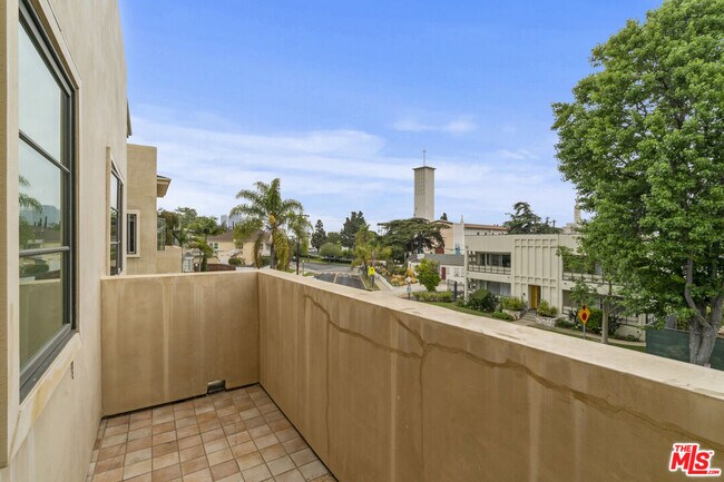 Building Photo - 10765 Wilkins Ave