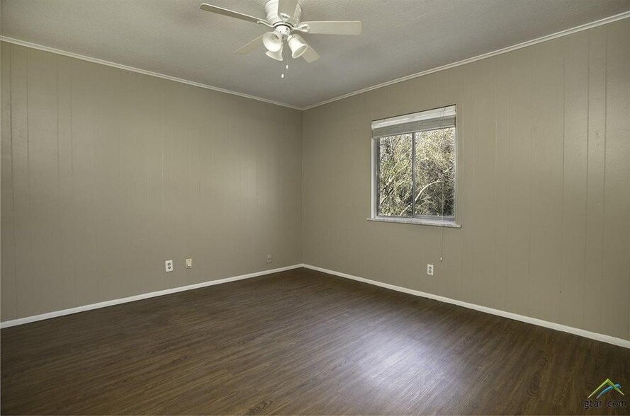 Faux wood flooring, fans, new paint! - 1511 Milam Dr