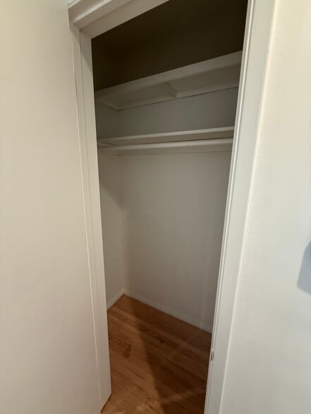 Hallway closet with more built in shelving - 811 S Catalina Ave