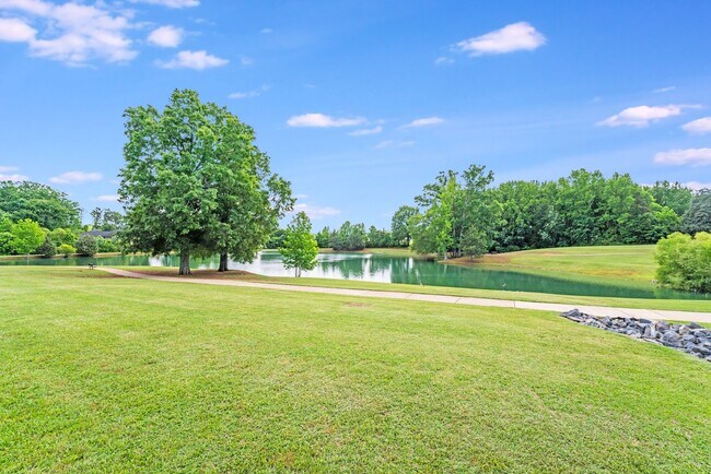 Building Photo - COMING SOON! Live Luxuriously in Summerwood – Fully Furnished 4BR Brick Home w/ Internet & Lawn C...