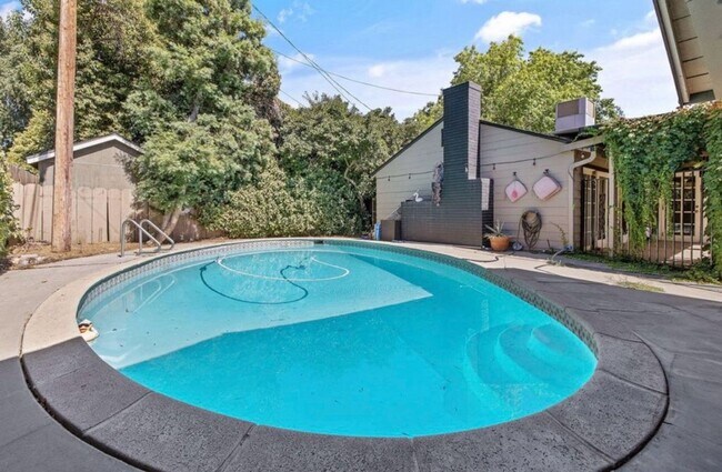 Building Photo - Beautiful home with Studio coming soon!