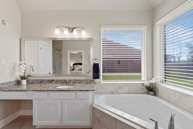 Building Photo - 9502 Windsong Dr