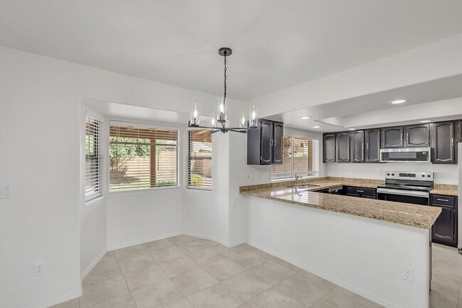 Building Photo - Gorgeous 4-Bedroom Home in Prime 85254 Loc...