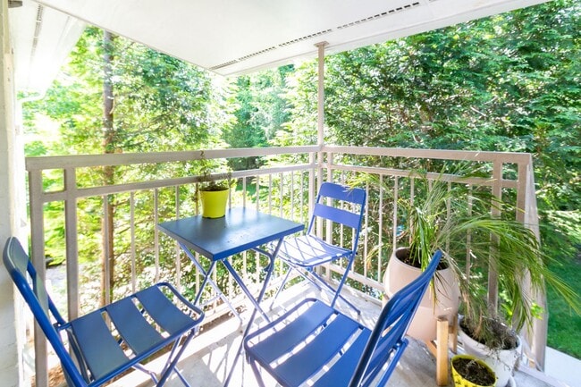 Building Photo - **Application pending 5/1/2026**Stunning Carrboro Condo available early June!