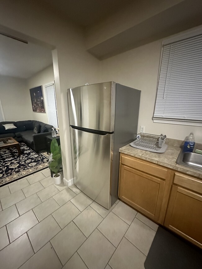 New stainless steel fridge - 4653 Bryant Ave N