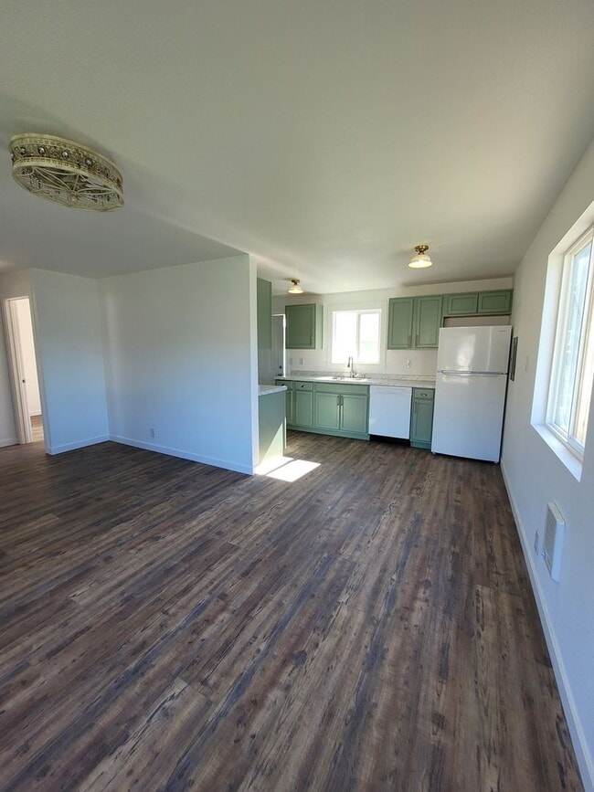 Building Photo - Free May rent with 1 Year Lease - Fully Remodeled with Garage & Yard Care Included