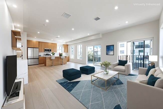 Building Photo - Modern 4-Bedroom Townhome-Style Living in ...