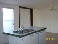 Building Photo - 3 bedroom, 2 bath, large bonus room, large covered porch, mobile home