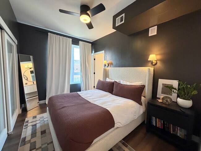 Building Photo - Top-Floor Corner Condo with Downtown Views — Stylish, Pristine, and Steps From Everything