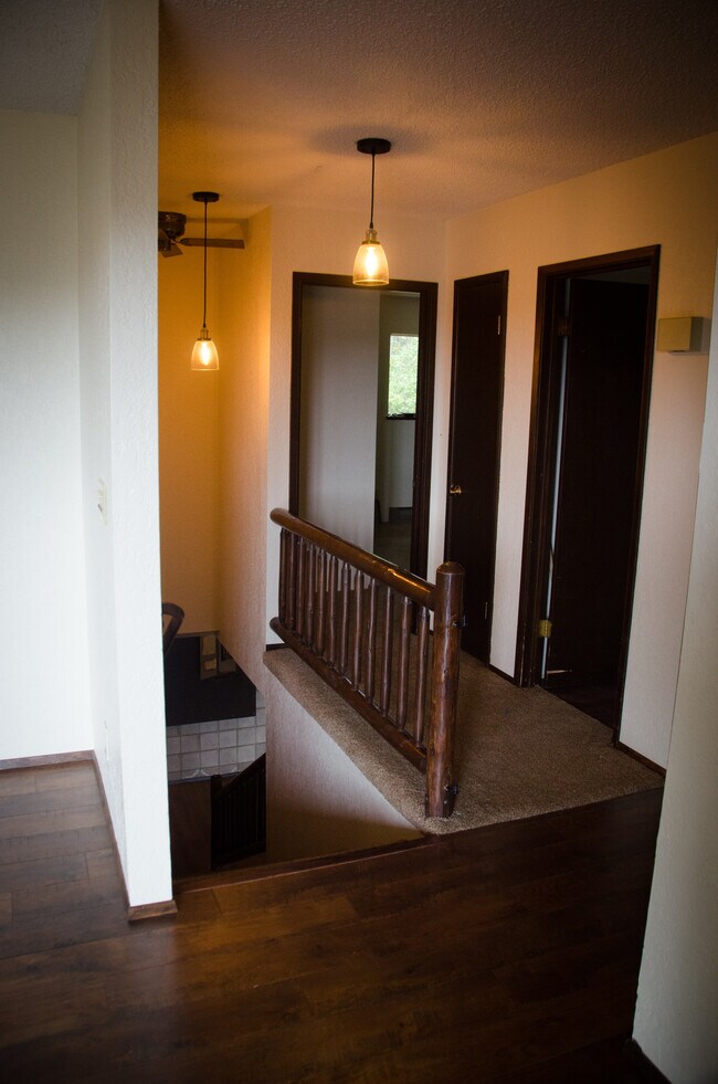 Entrance to the master bedroom, upstairs bathroom, and second upstairs bedroom - 11839 Glenwood Rd