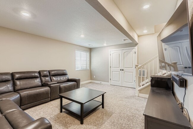 Building Photo - Welcome to this Beautifully Maintained 4-B...