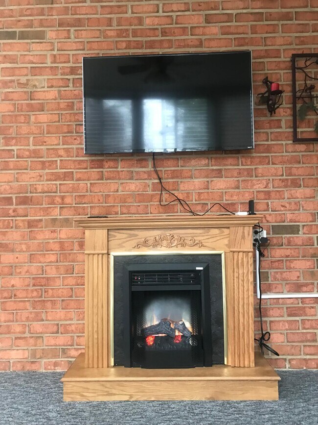 Heated and cooled sunroom with smart tv - 2102 Stephenson Ave SW