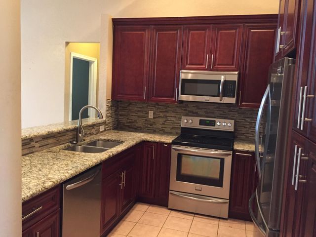 Building Photo - 6711 Stonecreek Street, Greenacres, FL 33413