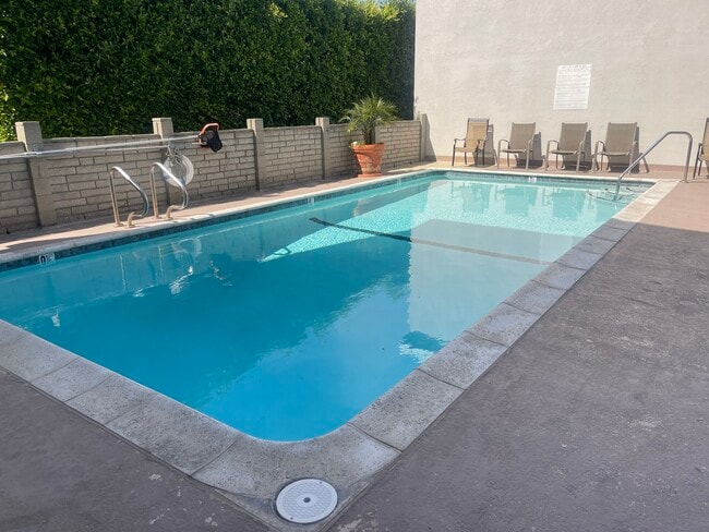 Nice size community pool. - 2411 Prospect Ave