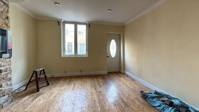 Building Photo - Philadelphia Rental with Modern Finishes and Stone Accent Wall.