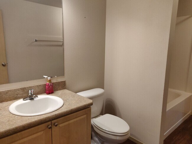 Building Photo - Charming 4-Bedroom Home on 1/2 Acre with a Fenced Backyard, Fully Insulated Double-Car Garage, in...