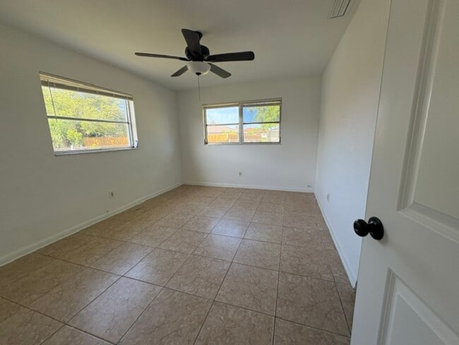 Building Photo - ****TWO WEEK FREE**** Charming 2-Bedroom Ranch in Cape Coral’s Bimini Basin Neighborhood