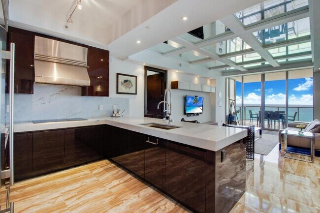 Building Photo - 9703 Collins Ave