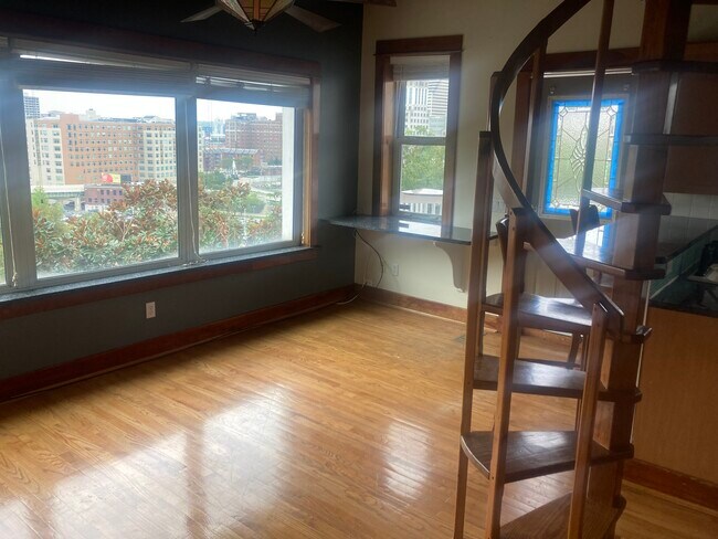spiral staircase to loft and storage - 915 Monastery St