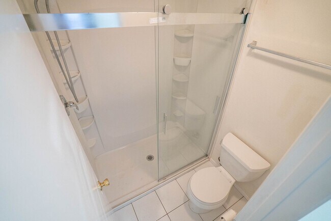 Building Photo - COMING SOON! 2-Bedroom Condo with some Uti...
