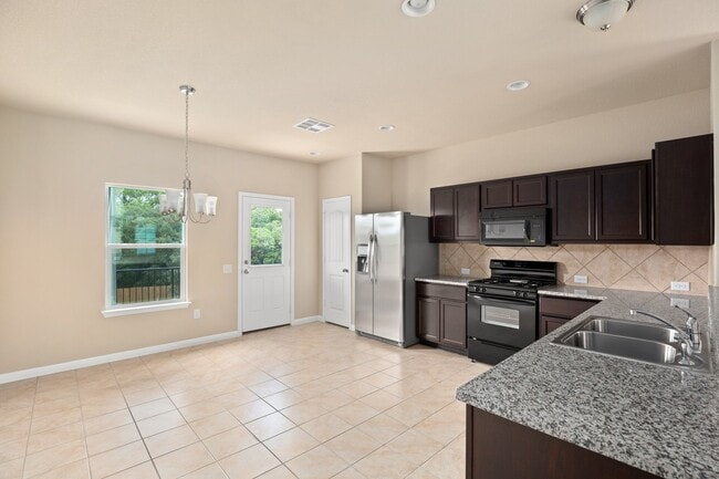 Building Photo - Beautiful 4/BR 2.5/BA Home Backing to Green Space in Pflugerville