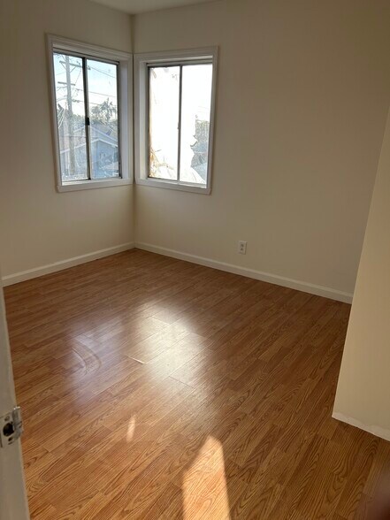 Bedroom 2 is freshly painted - 225 E Fremont Sq