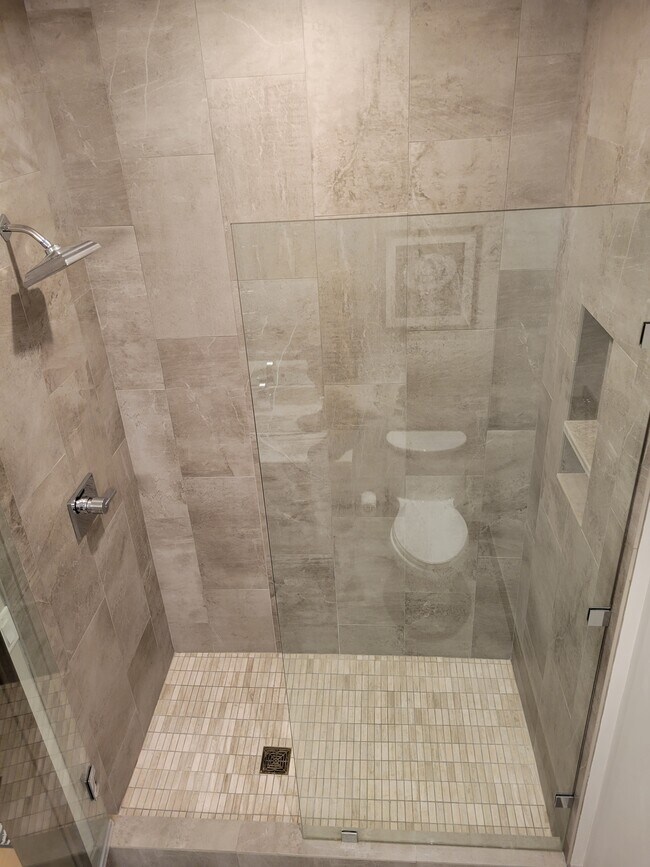 Tiled showers - 300 W Main St