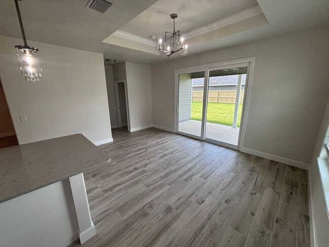 Building Photo - Welcome to this beautifully built 3-bedroom, 2-bathroom