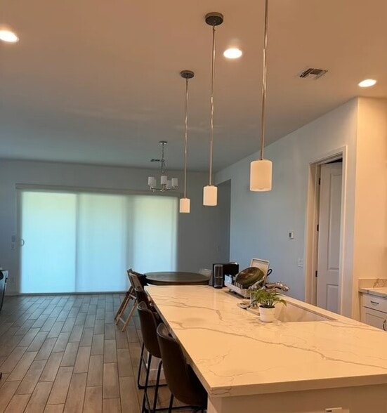Open Concept Kitchen with Island that flows into Dining Room - 835 E Hopi Trl