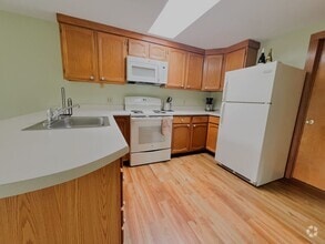 Building Photo - 1-Bedroom Apartment with Panoramic Wooded ...