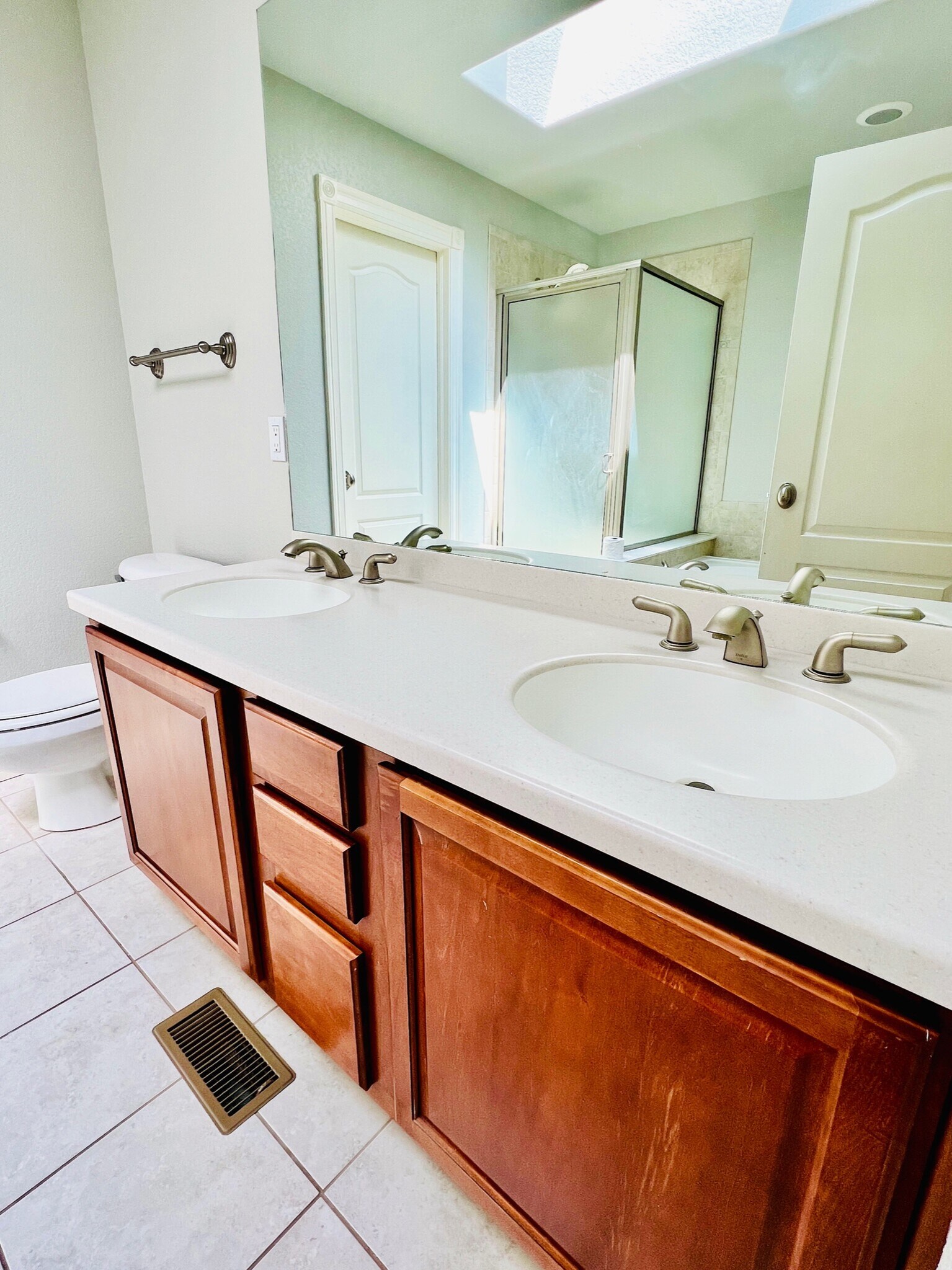 Master bathroom with skylight allowing for lots of natural lighting to come through. - 2317 Decatur St