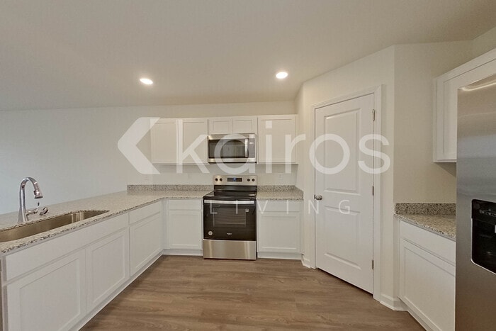 Building Photo - 7029 Peppermill Way