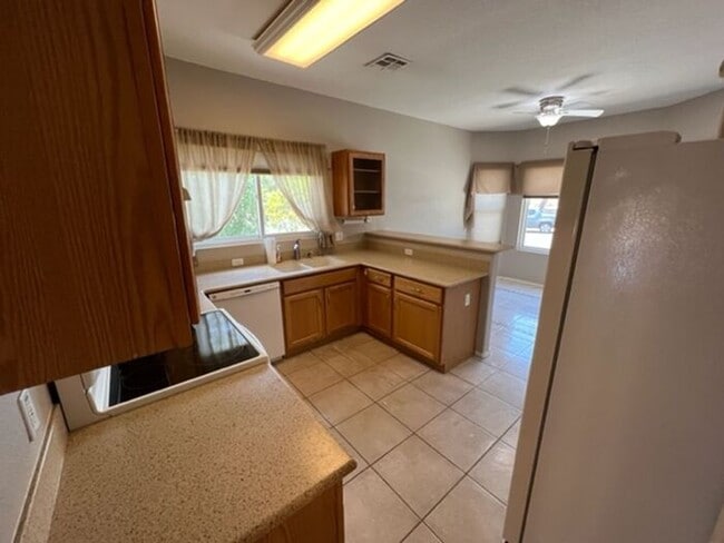 Building Photo - Bright 3BR NW Tucson Basecamp | Private Yard + 2-Car Garage