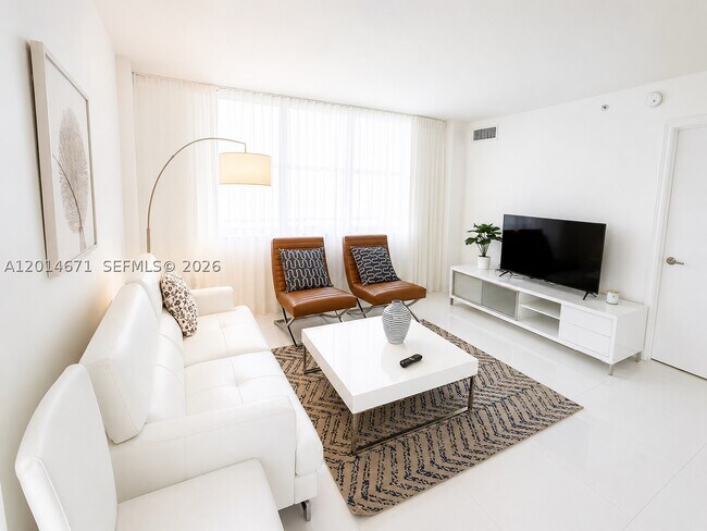 Building Photo - 6917 Collins Ave