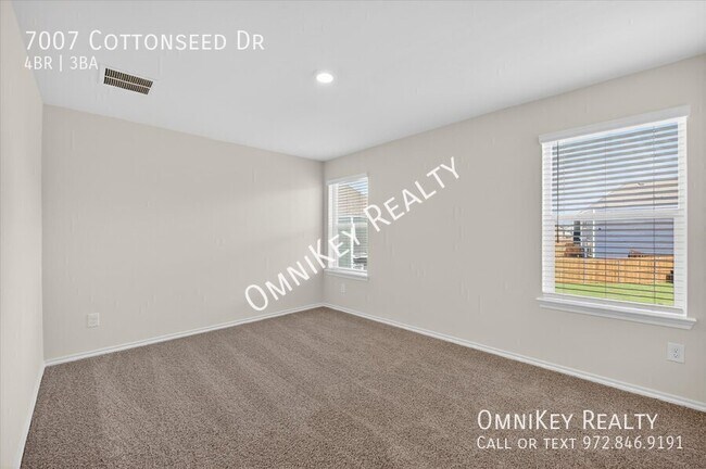 Building Photo - 7007 Cottonseed Dr
