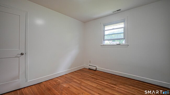 Building Photo - 870 Woodtick Rd