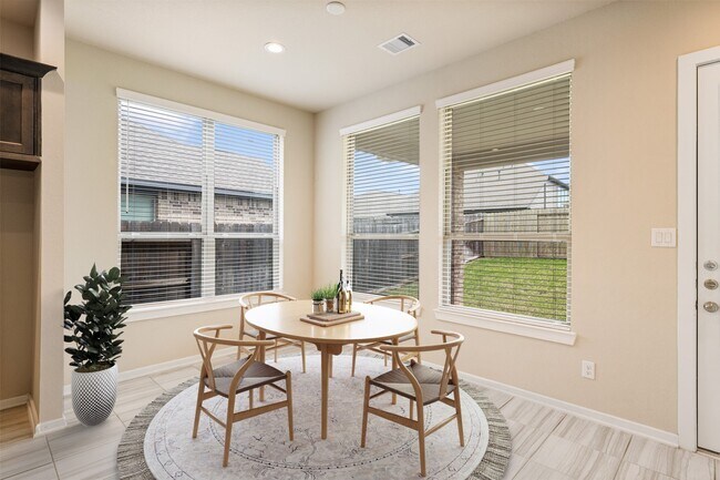 Building Photo - 8714 Windsong Trail Dr