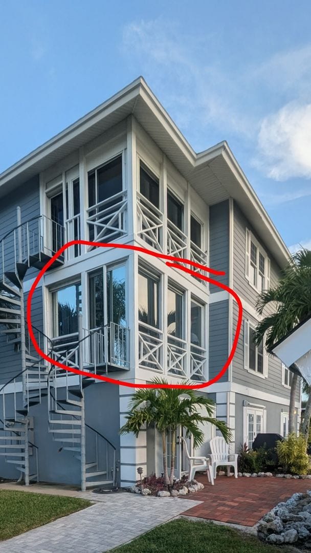 Building Photo - SEASONAL 2/2 coastal-inspired luxury condo with bay view, and boat slip