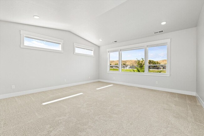 Building Photo - Luxury 4-Bedroom Home for Rent in Dry Cree...