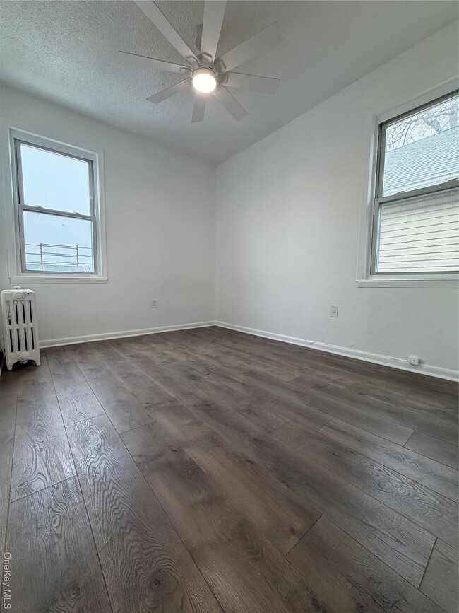 Building Photo - 122-15 11th Ave