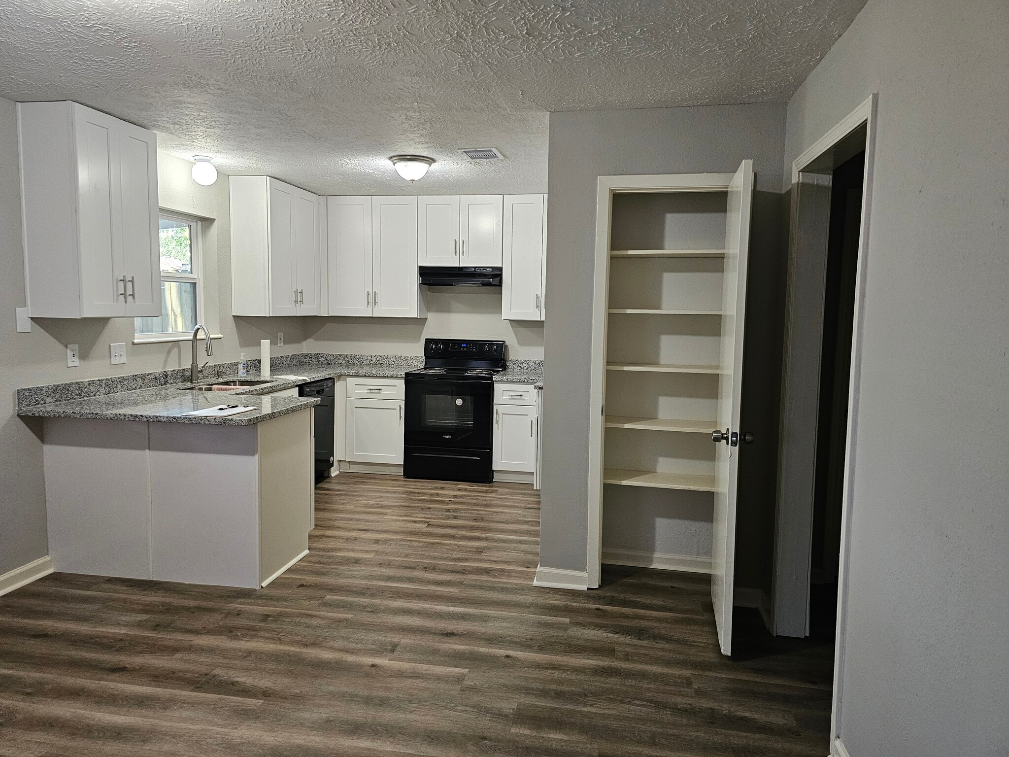 kitchen with pantry - 9806 Thrush St
