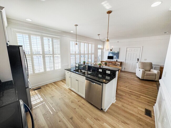Building Photo - Fully Furnished Waterfront Elegance on Mai...