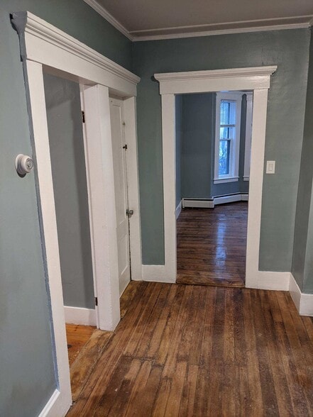 From bedroom looking to bedroom 1 entry - 21 Charles St