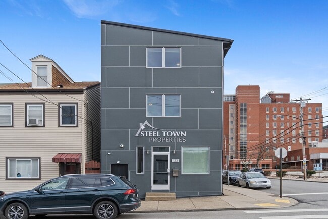 Building Photo - MASSIVE MODERN RENOVATION WITH OPEN LAYOUT...