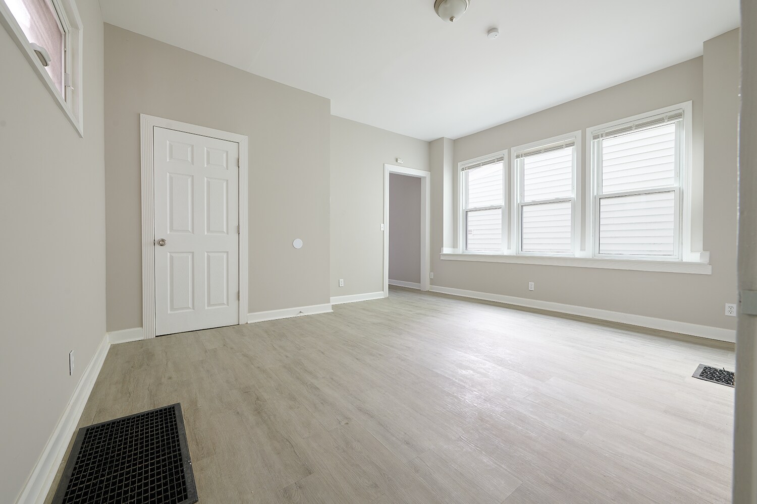 Living room has additional coat closet and entrance to kitchen - 2354 Victor St