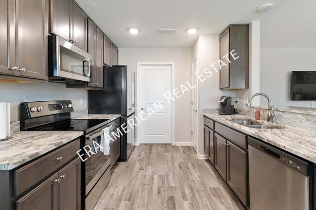 Building Photo - 6002 Colton Blaine Ct