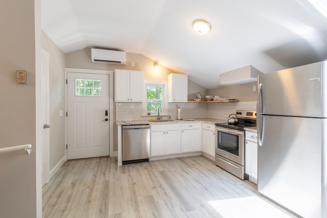 Building Photo - Spacious 4-Bedroom Home with In-Law Suite