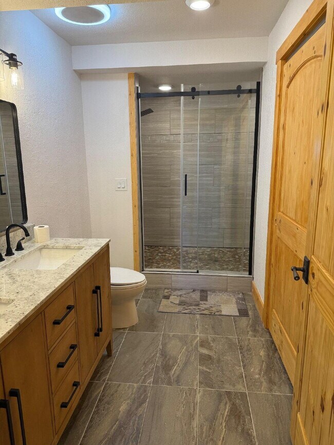 Building Photo - "Cozy 3-Bedroom Mountain Home with 2 Full ...